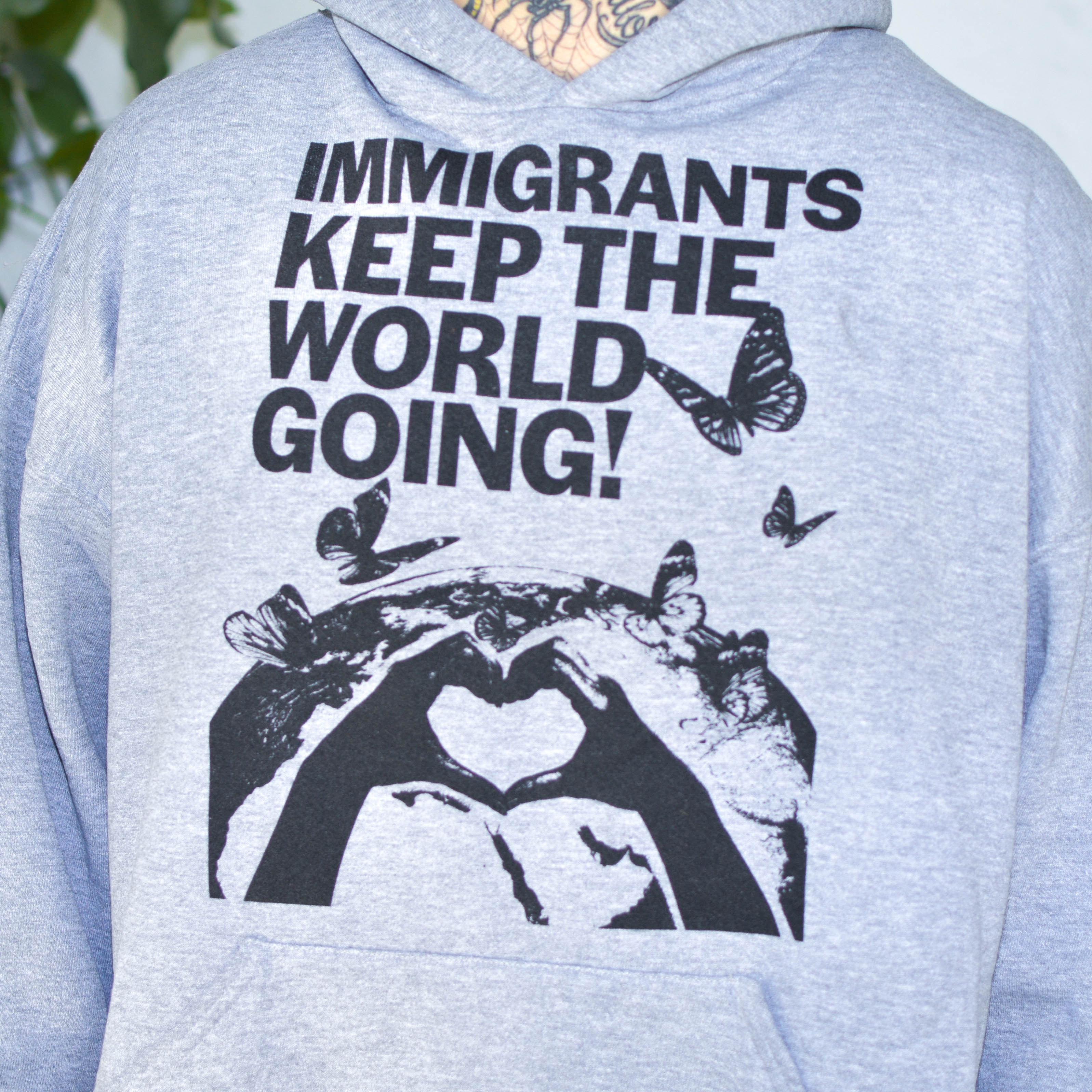 Gray Sweatshirt - "Immigrants Keep the World Going" Solidarity Merch