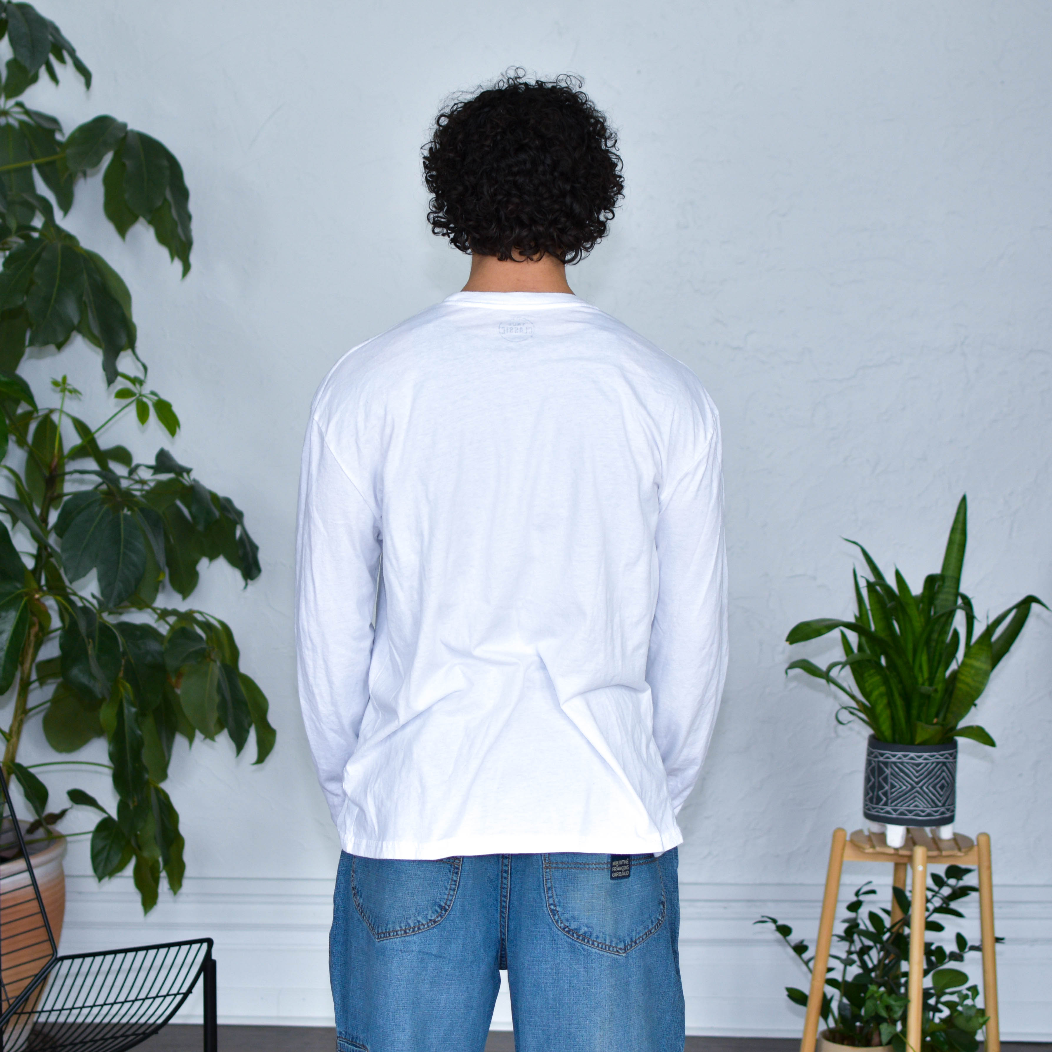 White Long Sleeve Shirt - "Immigrants Keep the World Going" Solidarity Merch