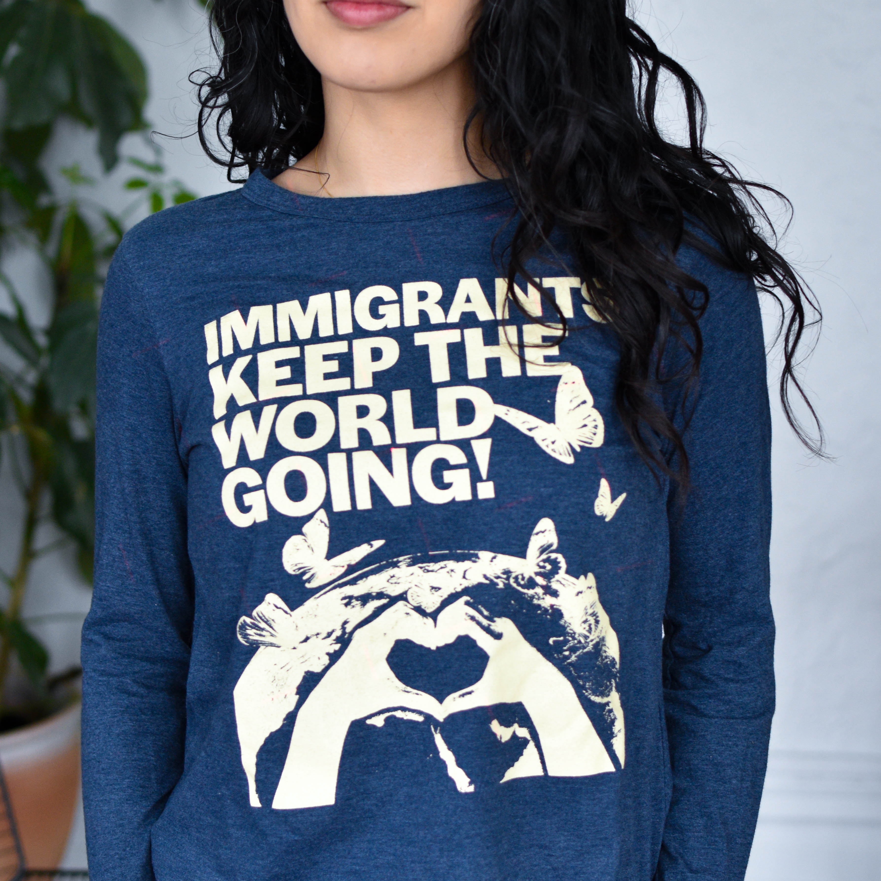 Blue Long Sleeve Shirt - "Immigrants Keep the World Going" Solidarity Merch