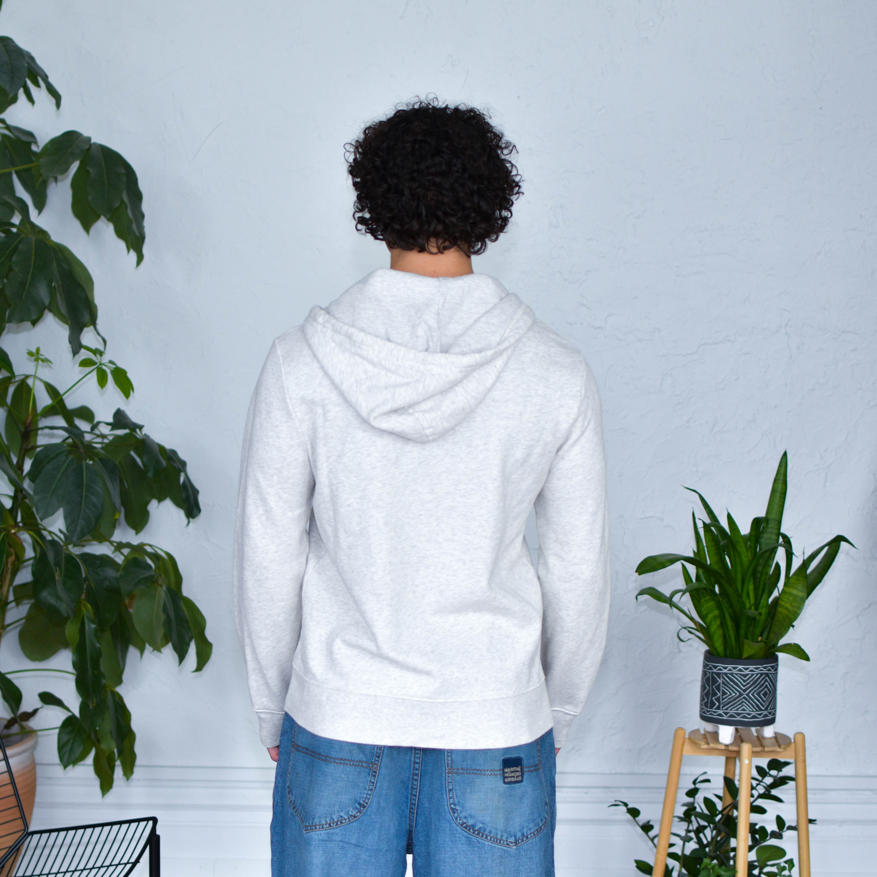 Gray Zip-Up Sweatshirt "Immigrants Keep the World Going" Solidarity Merch