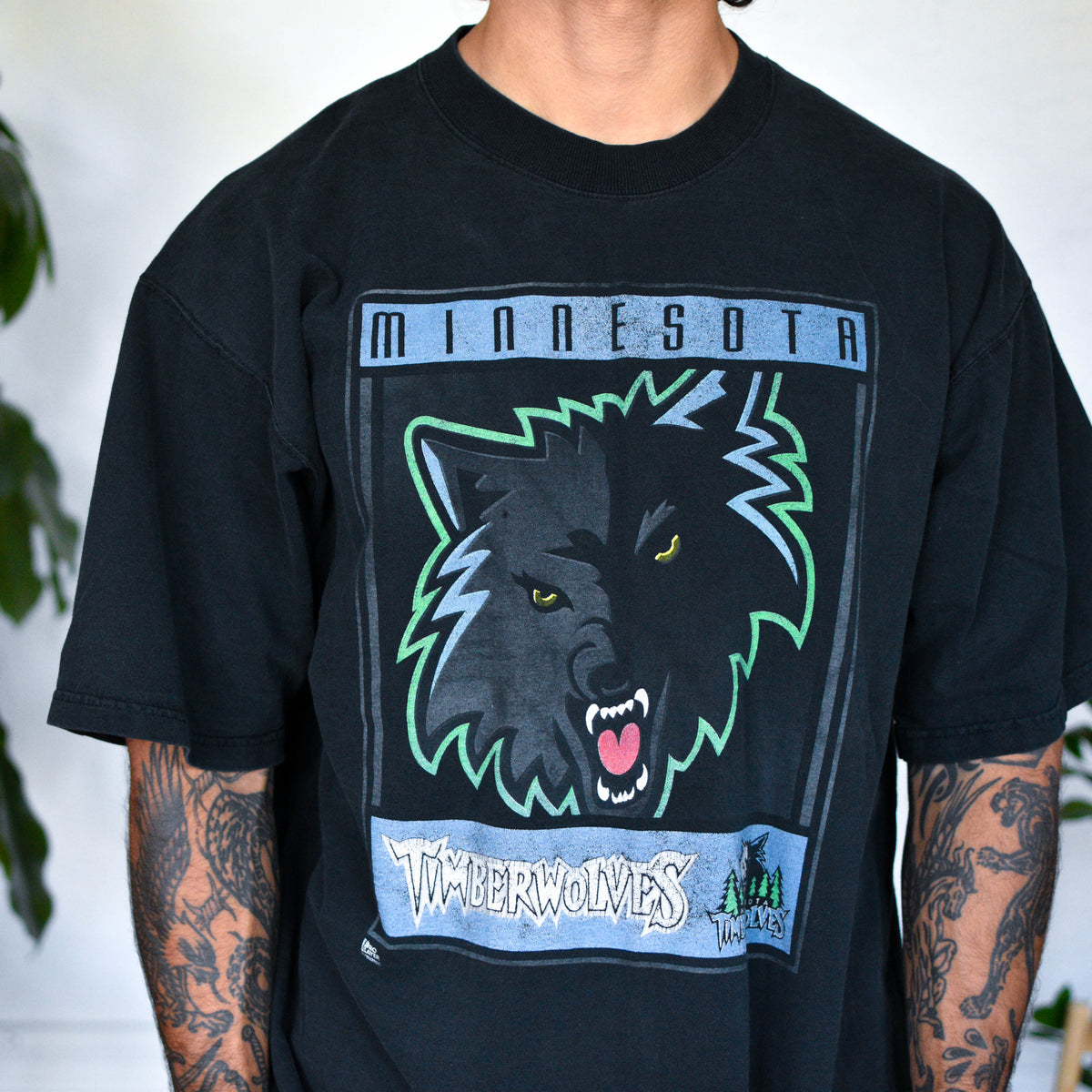 Vintage 90s Minnesota Timberwolves Pro Player Black Graphic T-Shirt