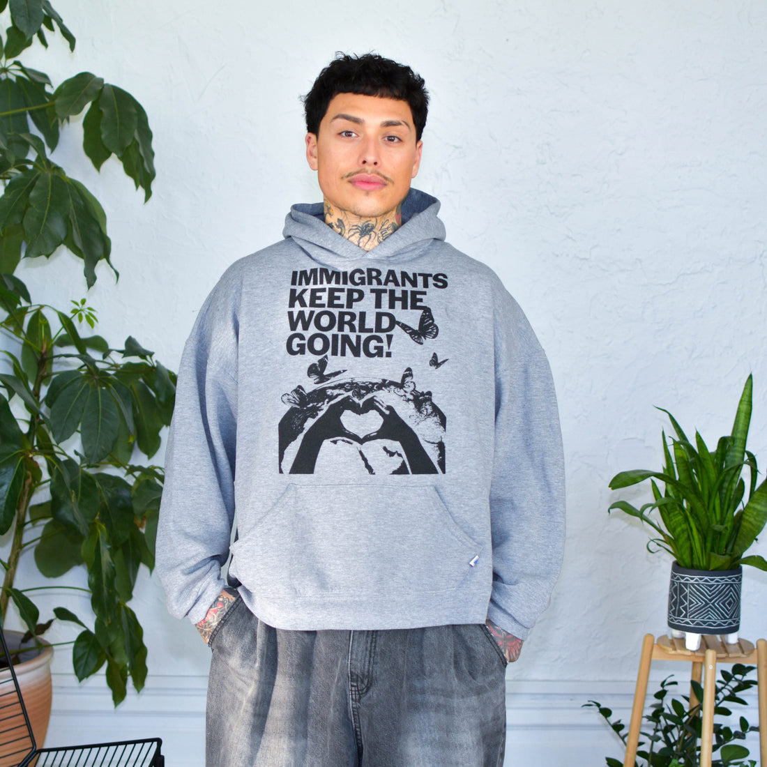 Gray Sweatshirt - "Immigrants Keep the World Going" Solidarity Merch