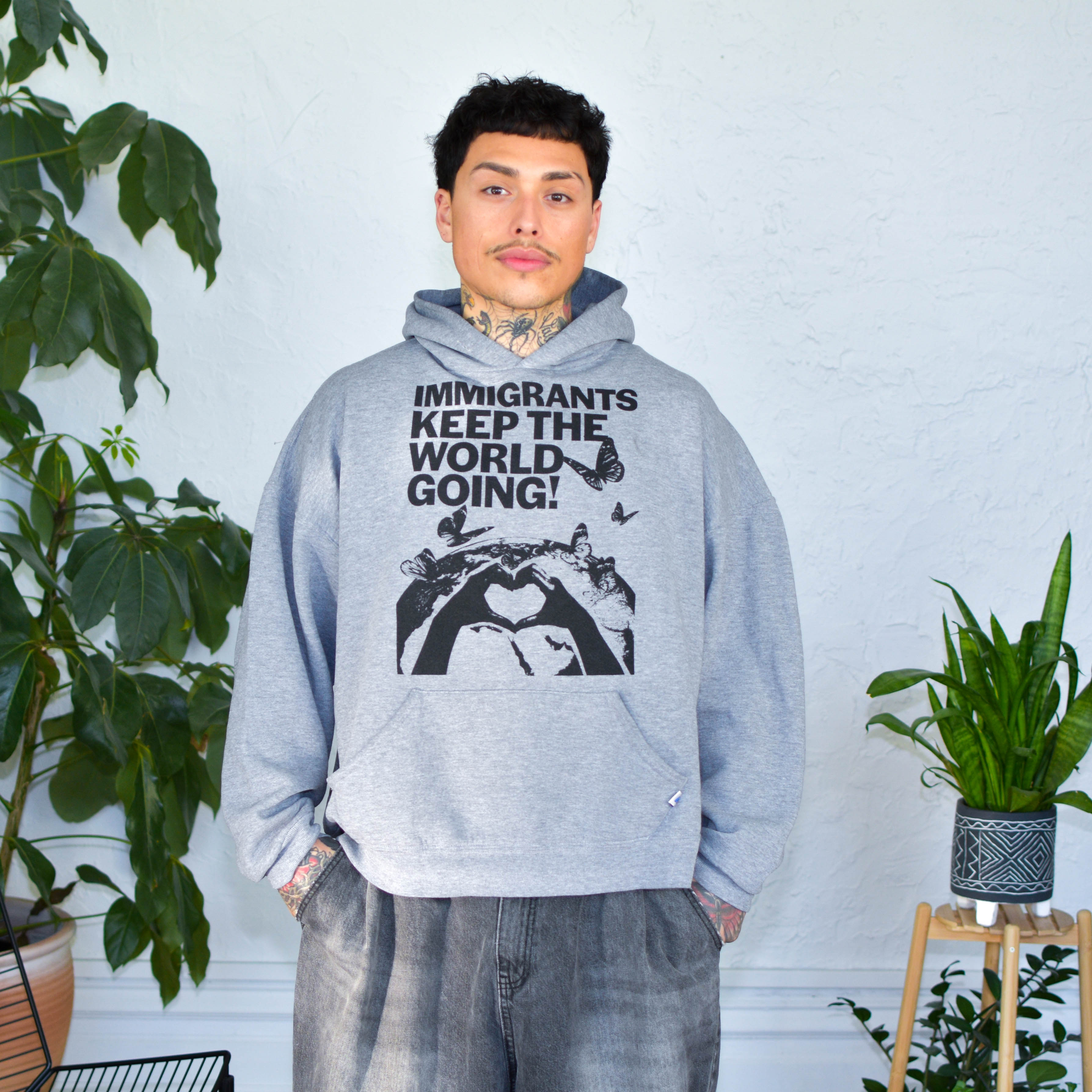 Gray Sweatshirt - "Immigrants Keep the World Going" Solidarity Merch