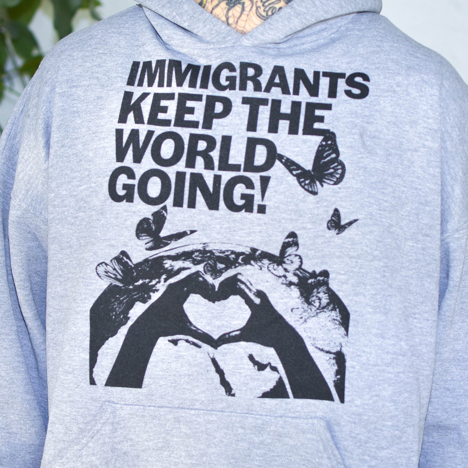 Gray Sweatshirt - "Immigrants Keep the World Going" Solidarity Merch