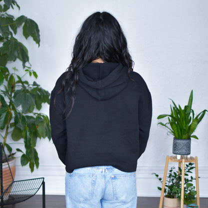 Black Cropped Hoodie "Immigrants Keep the World Going" Solidarity Merch