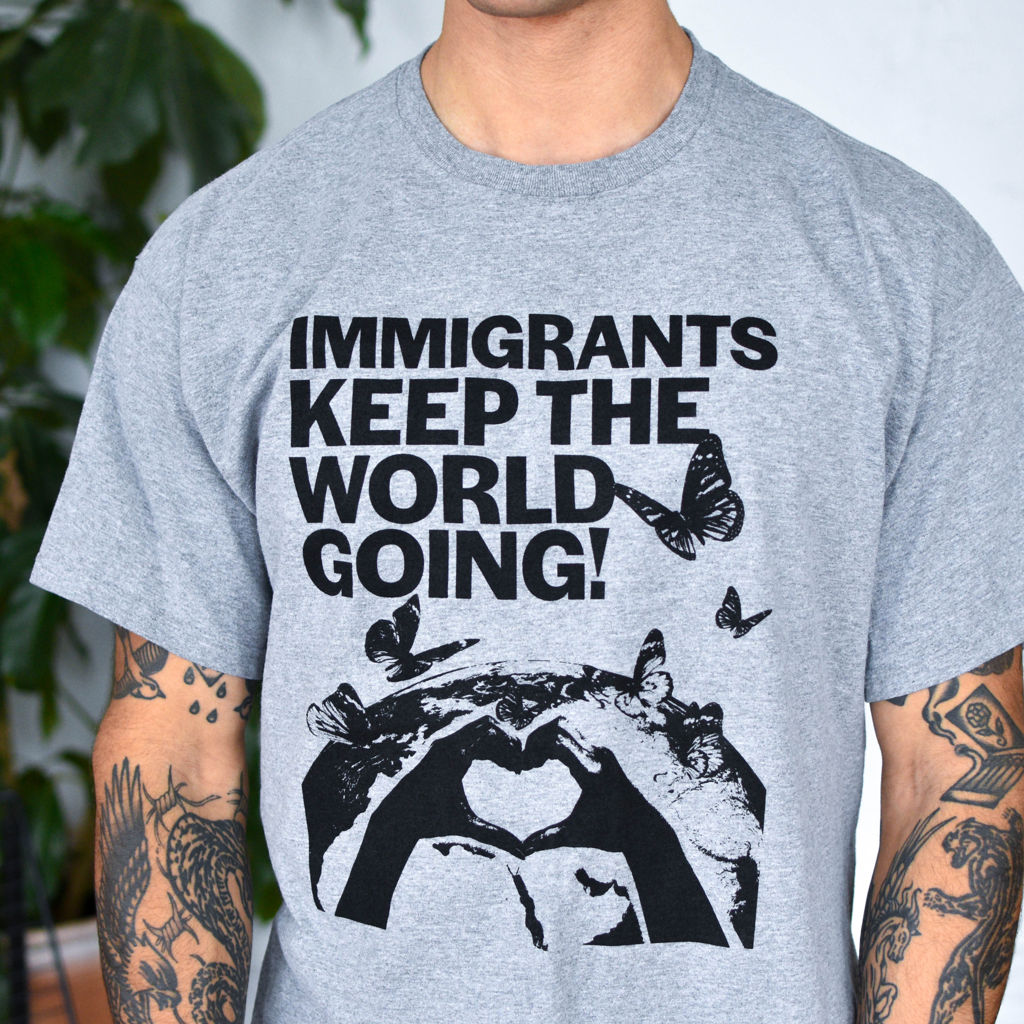 Gray T-Shirt - "Immigrants Keep the World Going" Solidarity Merch
