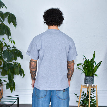 Gray T-Shirt - "Immigrants Keep the World Going" Solidarity Merch