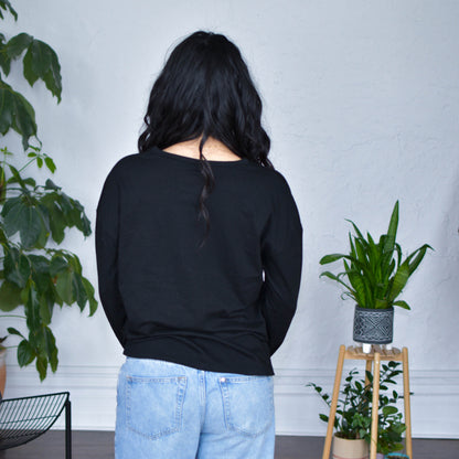 Black Long Sleeve Shirt - "Immigrants Keep the World Going" Solidarity Merch