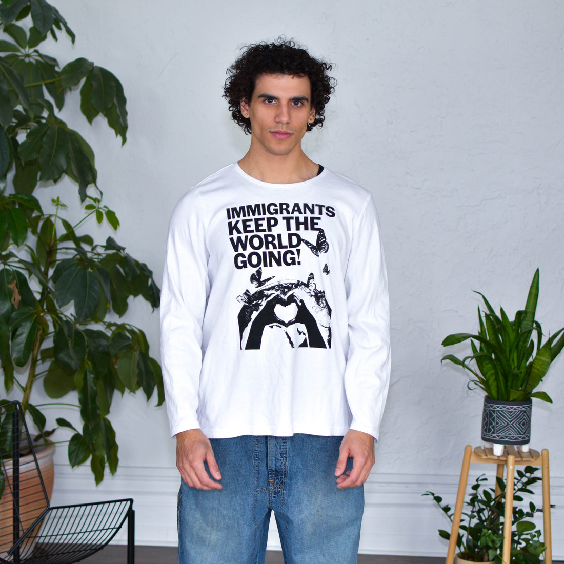 White Longsleeve Shirt - "Immigrants Keep the World Going" Solidarity Merch