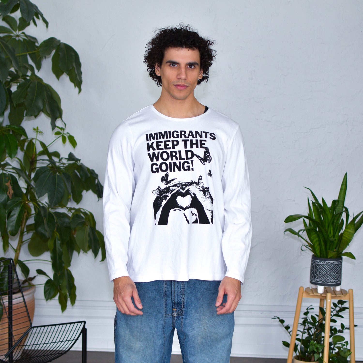 White Longsleeve Shirt - "Immigrants Keep the World Going" Solidarity Merch