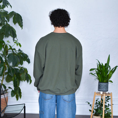 Green Sweatshirt "Immigrants Keep the World Going" Solidarity Merch