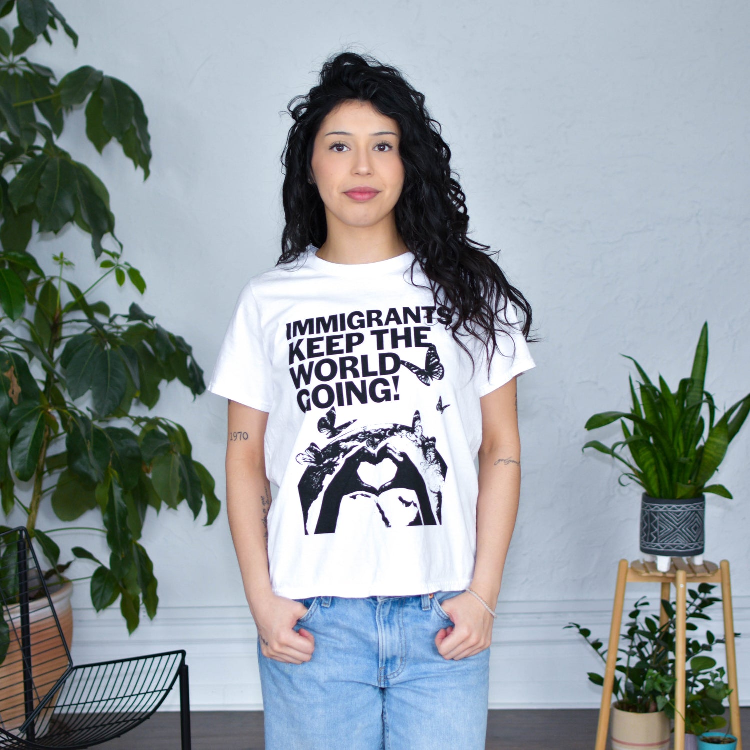 White T-Shirt "Immigrants Keep the World Going" Solidarity Merch