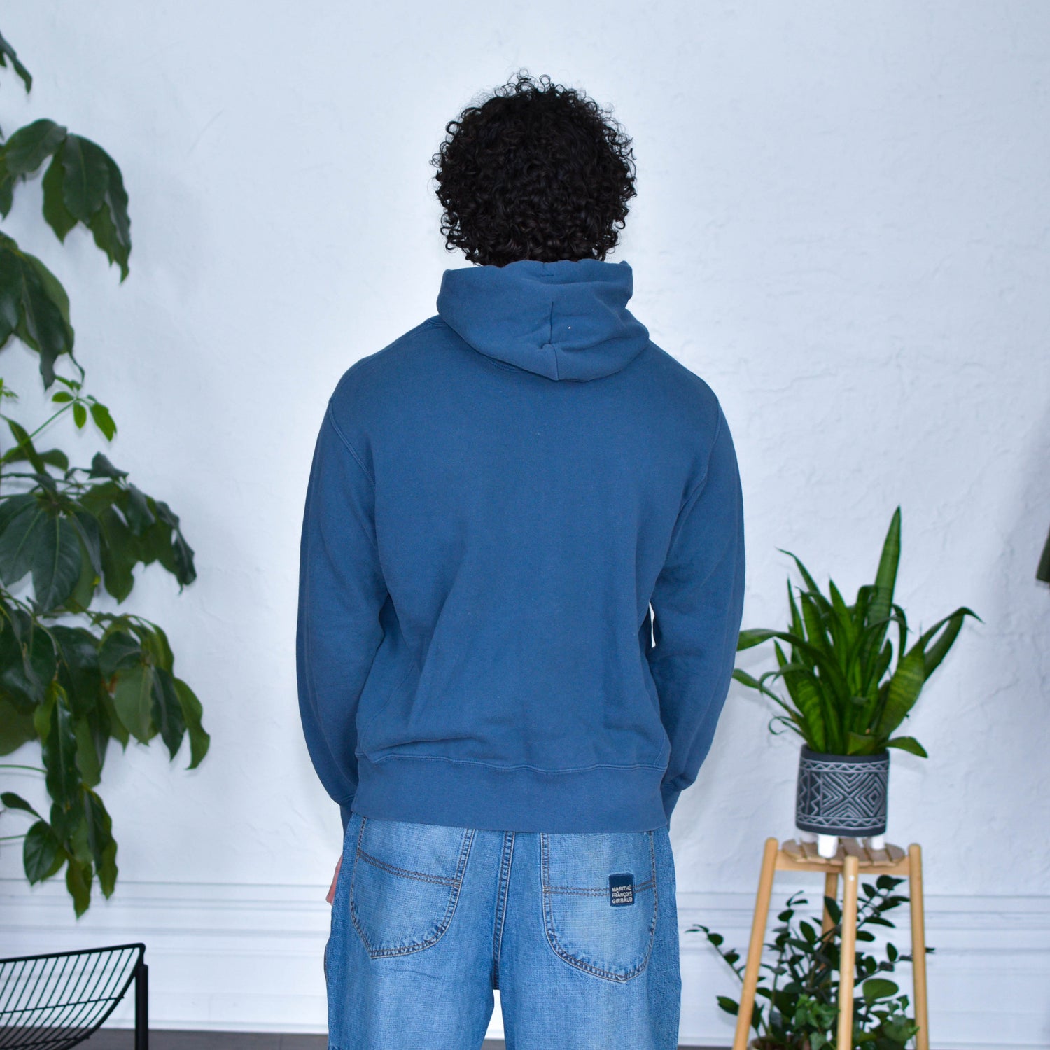 Blue Hoodie "Immigrants Keep the World Going" Solidarity Merch