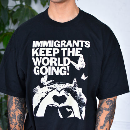 Black T-Shirt - "Immigrants Keep the World Going" Solidarity Merch