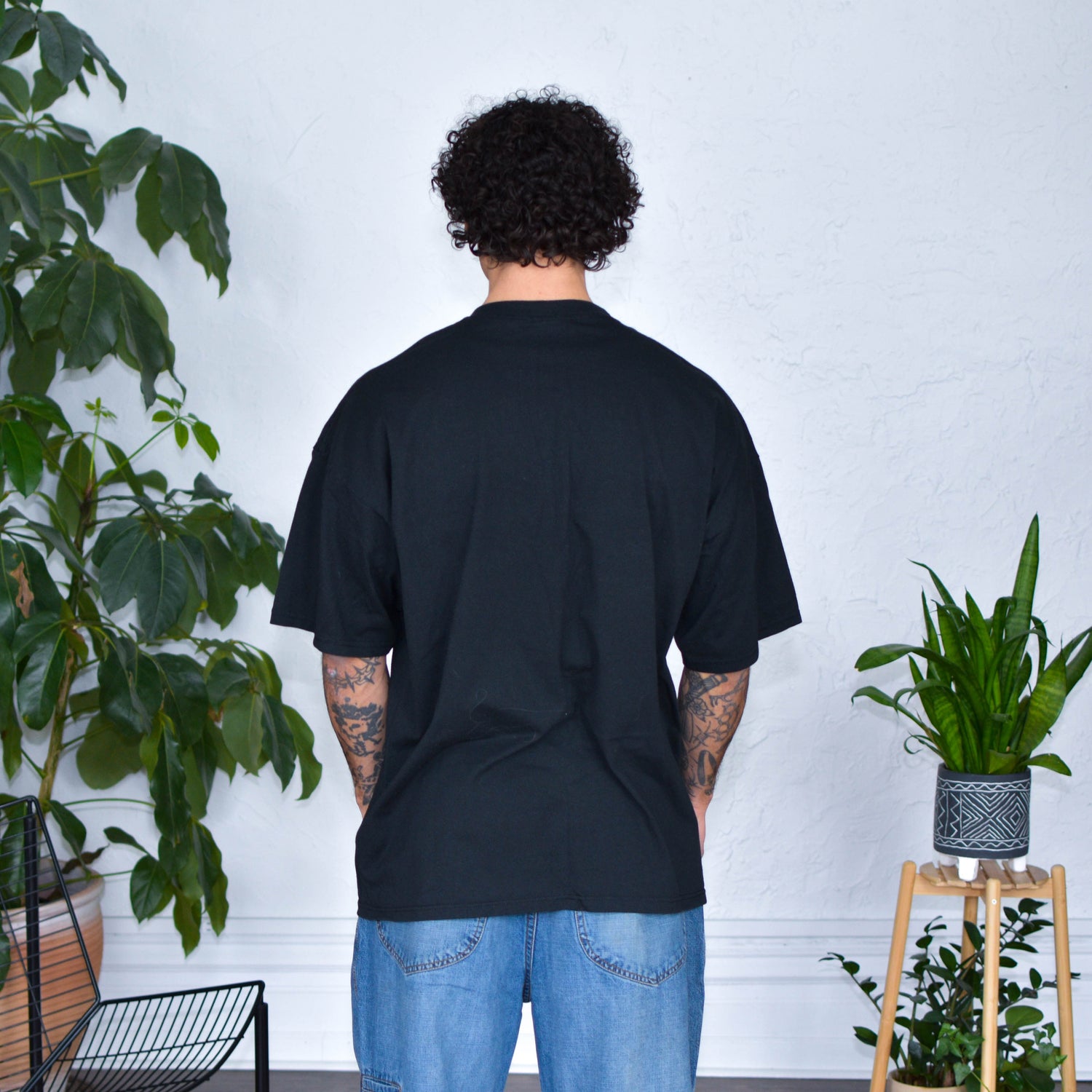 Black T-Shirt - "Immigrants Keep the World Going" Solidarity Merch