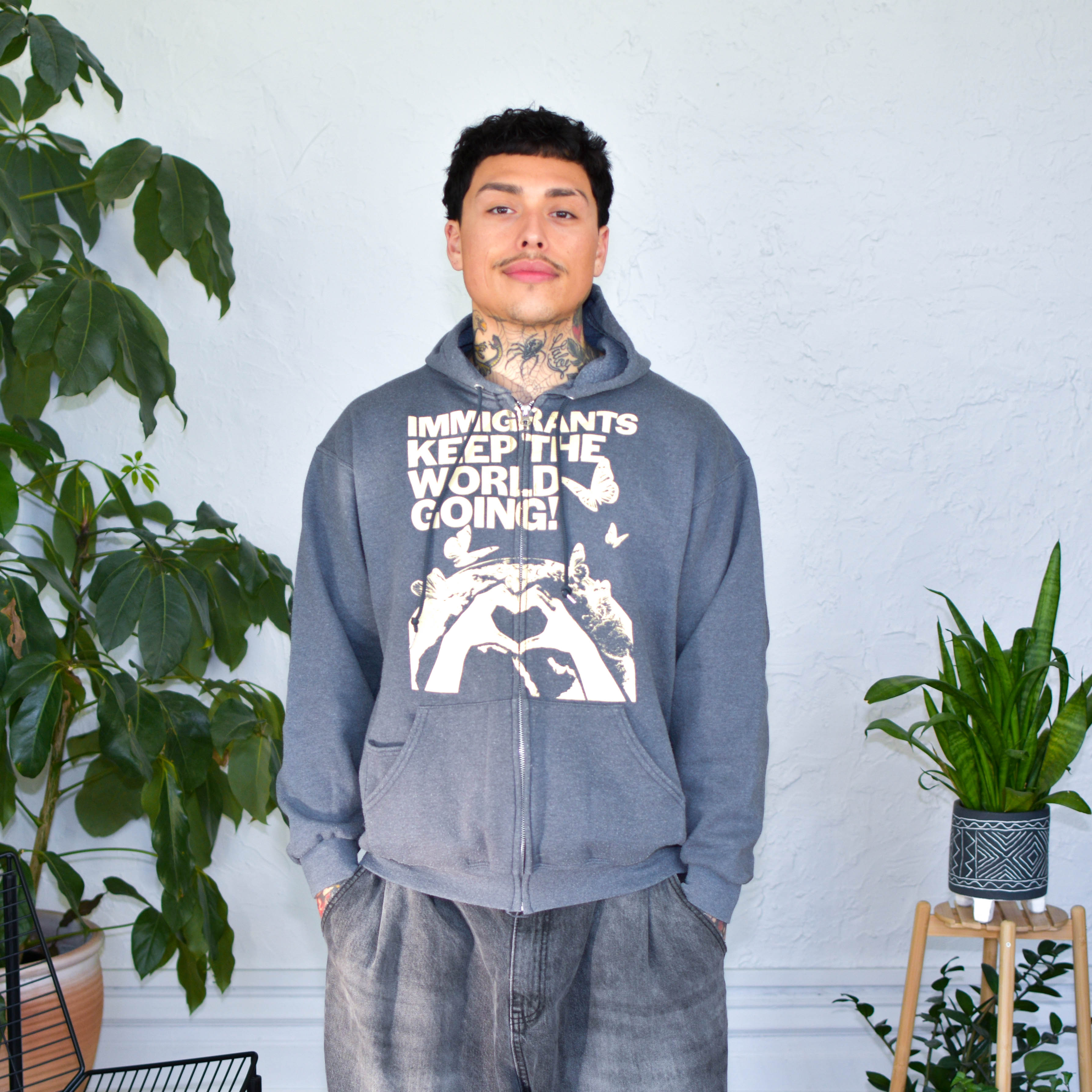 Gray Zip-Up Sweatshirt - "Immigrants Keep the World Going" Solidarity Merch