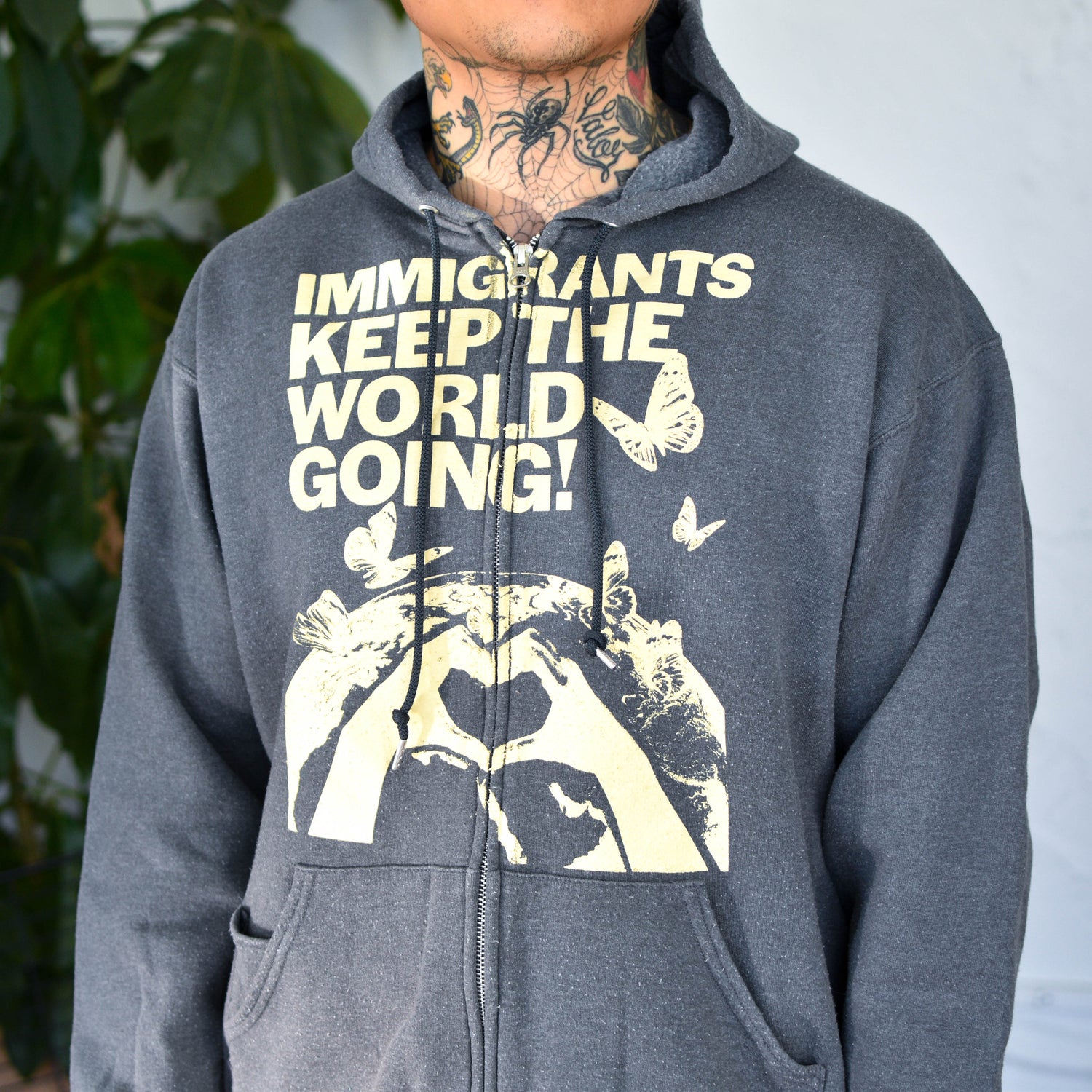 Gray Zip-Up Sweatshirt - "Immigrants Keep the World Going" Solidarity Merch