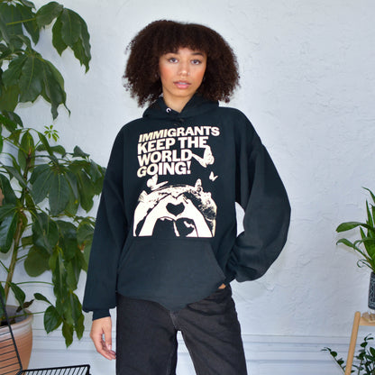 Black Sweatshirt - "Immigrants Keep the World Going" Solidarity Merch