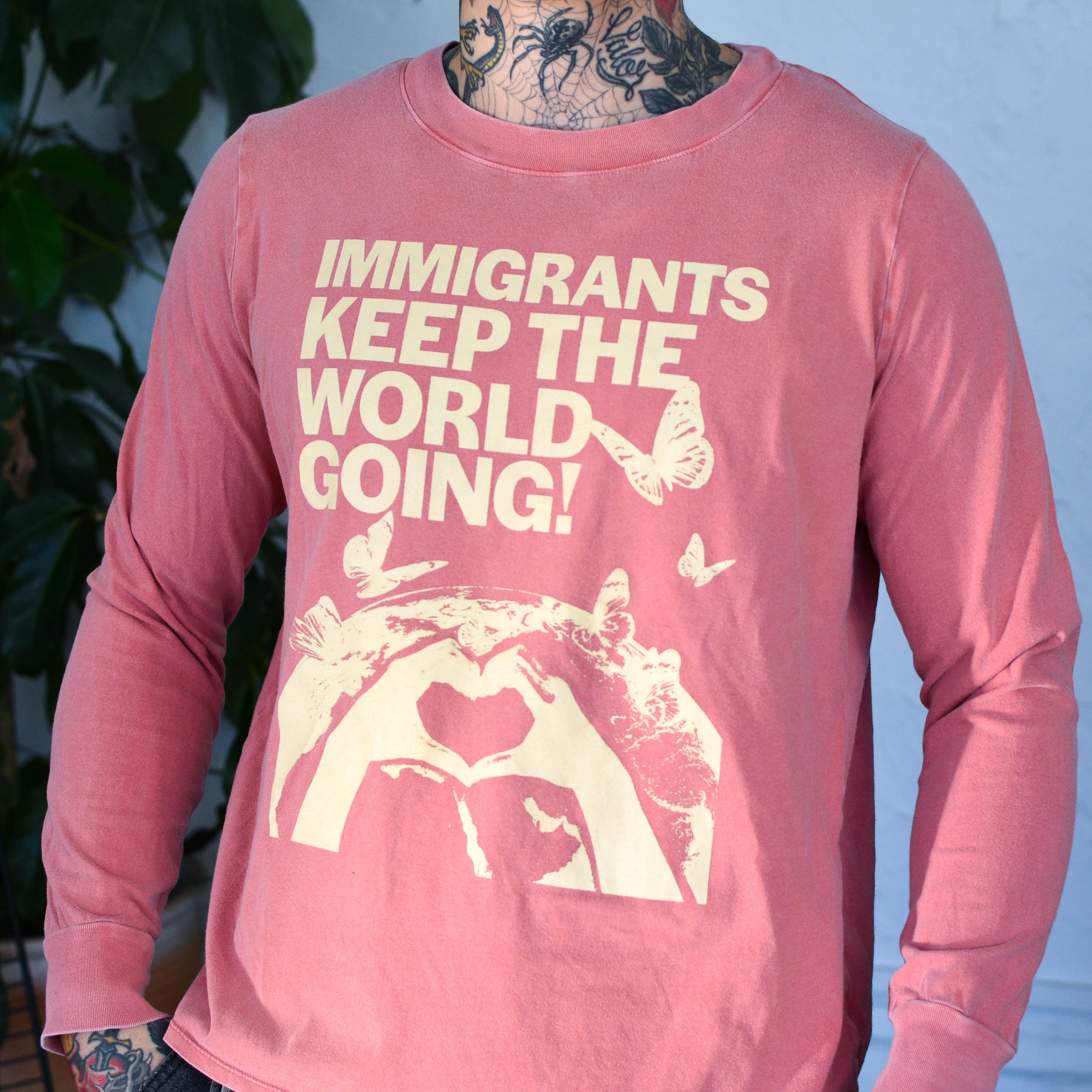 Pink Long Sleeve - "Immigrants Keep the World Going" Solidarity Merch